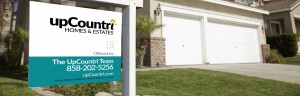 Image of UpCountri "For Sale" sign front of a home